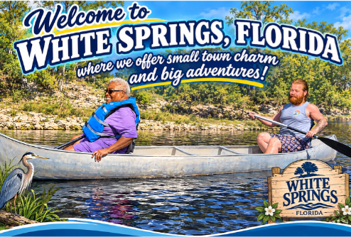 Two paddlers canoeing on the river. Welcome to White Springs, Florida, where we offer small town charm and big adventures.